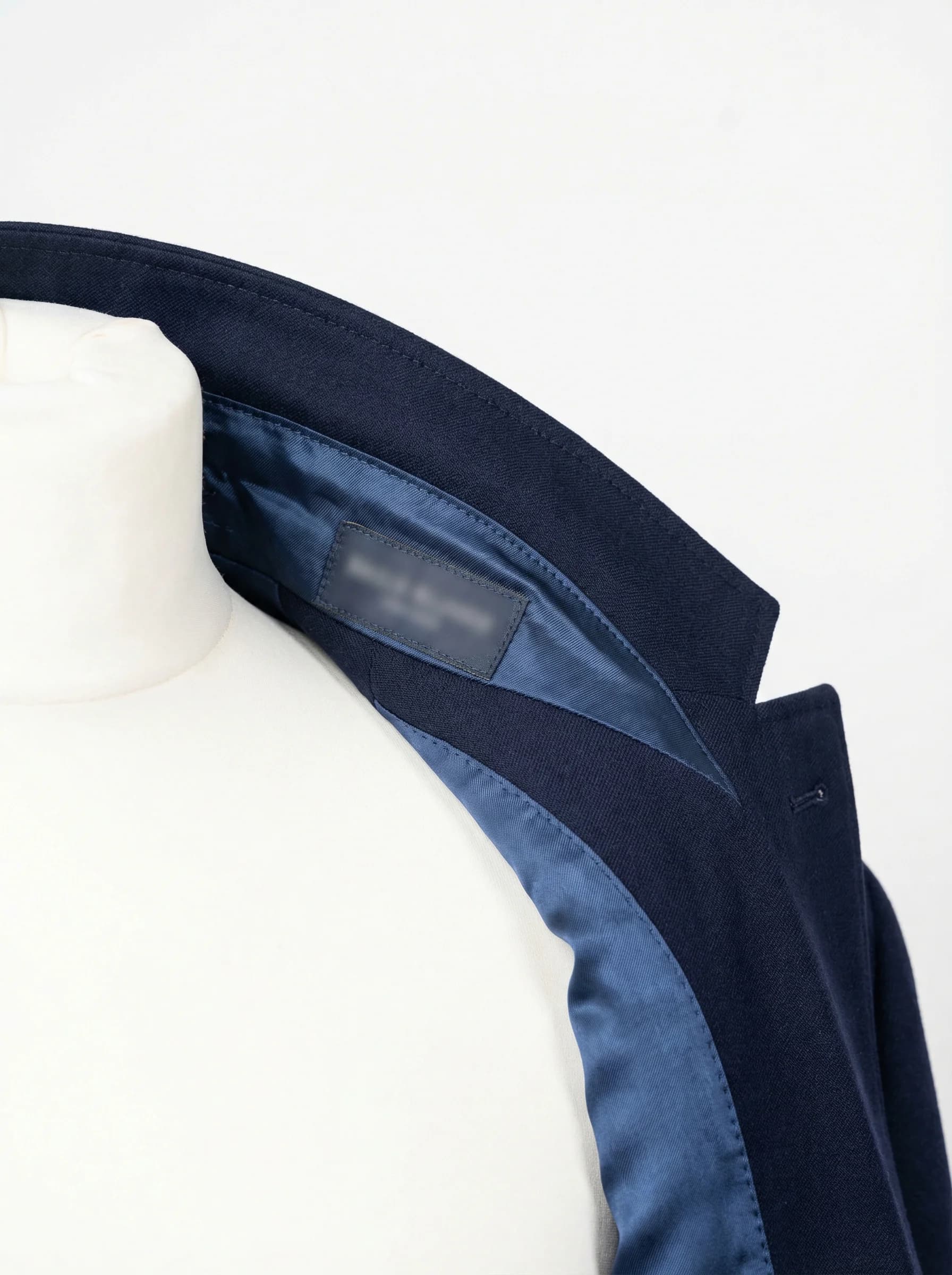 Interior collar detail shot of blazer for ghost mannequin composite editing